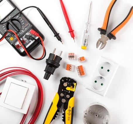 Thumbnail of an array of electrician tools, including pliers, a multimeter, an outlet cover and more
