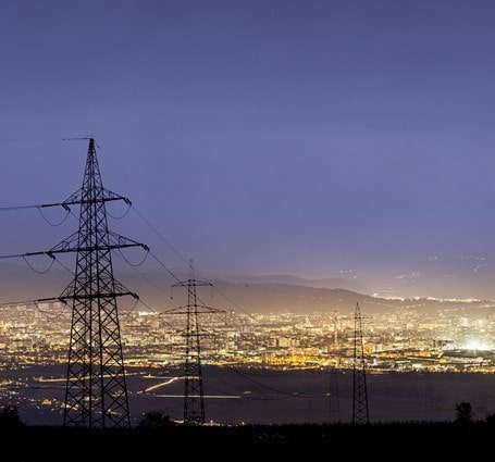 Thumbnail of a power grid illuminating a dark city